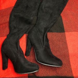 Thigh high black boots